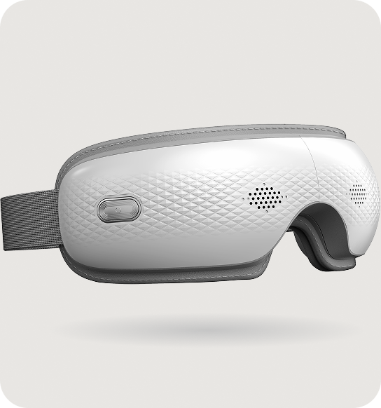 Zbliżenie na boczny przycisk sterowania i teksturę obudowy masażera oczu SKG ES300