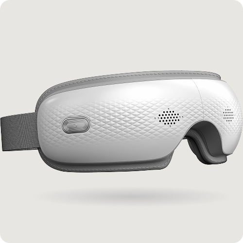 Zbliżenie na boczny przycisk sterowania i teksturę obudowy masażera oczu SKG ES300