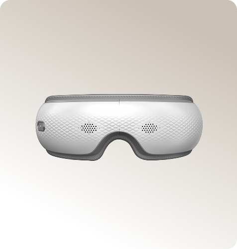 Masażer oczu SKG ES300 w kolorze biało-szarym, z teksturą przypominającą romby na obudowie