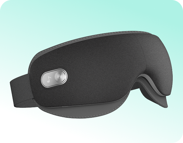 Masażer oczu SKG ES500 w kolorze szarym, z przyciskiem do sterowania muzyką i regulowanym paskiem