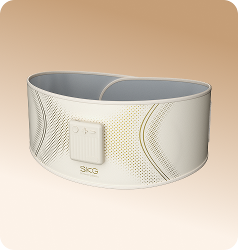 Pas treningowy SKG GS300 w kolorze beżowym, z panelem sterowania na boku i złotym, perforowanym wzorem na zewnątrz