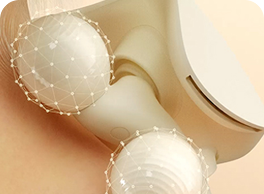 Zbliżenie na kuliste głowice masażera karku SKG HS500-2, z wizualizacją punktów masujących na powierzchni