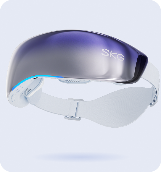 Masażer oczu SKG KS700 w kolorze białym ze srebrno-fioletową, lustrzaną osłoną