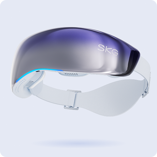 Masażer oczu SKG KS700 w kolorze białym ze srebrno-fioletową, lustrzaną osłoną