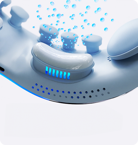 Zbliżenie na wewnętrzną część masażera oczu SKG. Widoczne są niebieskie głowice i bąbelki.