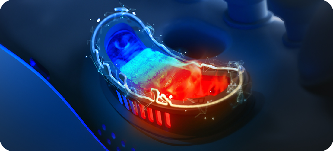 Wizualizacja funkcji masażera: kapsuła emitująca chłód (niebieski) i ciepło (czerwony) w jednym punkcie urządzenia
