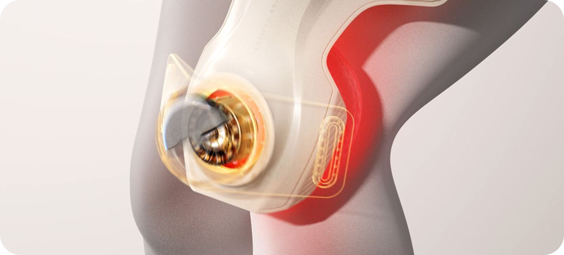 Masażer kolan SKG WS500 na nodze, z wizualizacją działania ciepła i światła wewnątrz stawu
