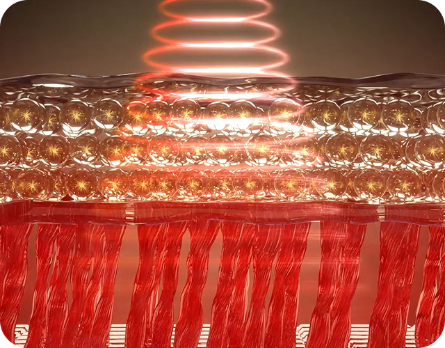 Schemat warstw skóry z promieniami światła i ciepłem przenikającymi przez komórki, docierającymi do mięśni